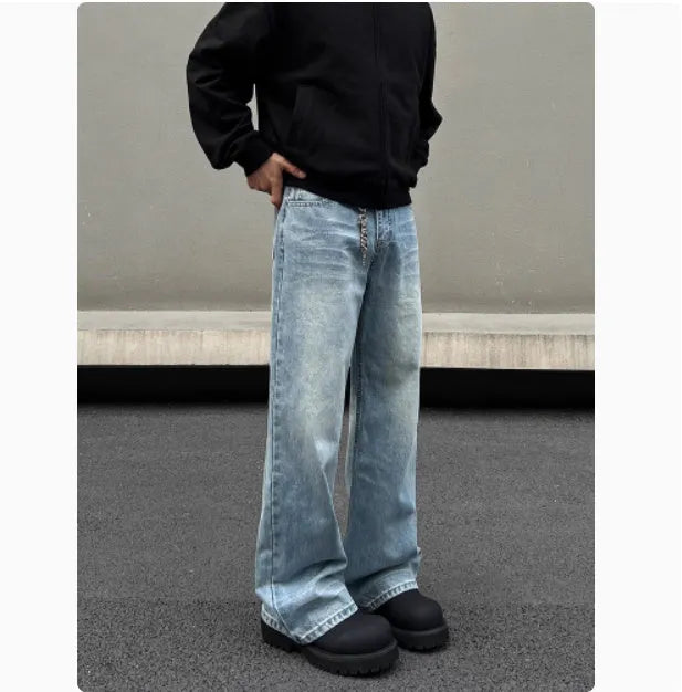 Men's retro whisker washed blue straight jeans with visible stitching and medium-high waist.