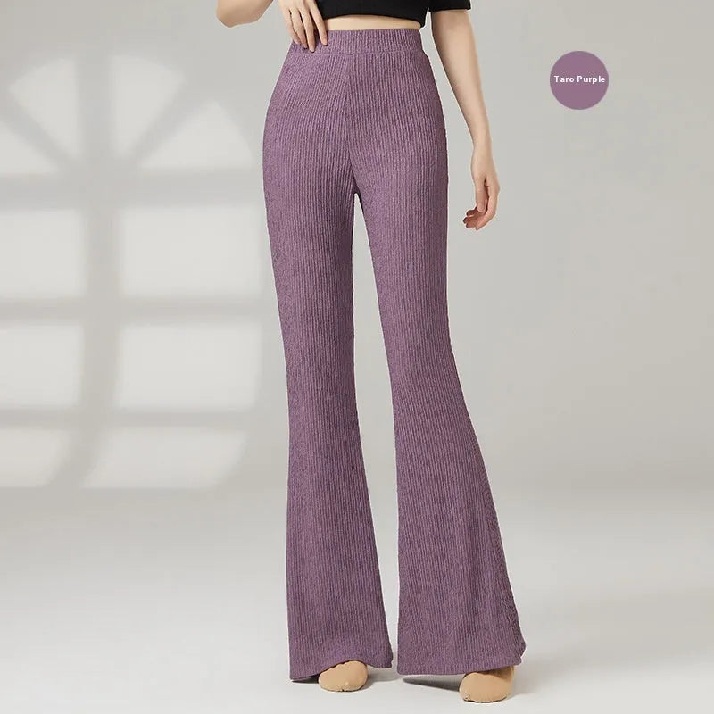 Close-up of solid colour polyester dance practice trousers for women, showing the form-fitting fit.