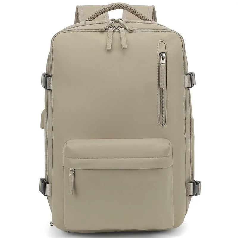 Large grey waterproof Oxford cloth travel backpack with curved shoulder straps shown front view.