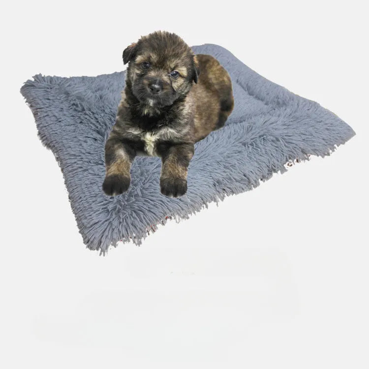 Gray self-heating pet blanket nest with long plush fur and non-slip black bottom, 61x51 cm