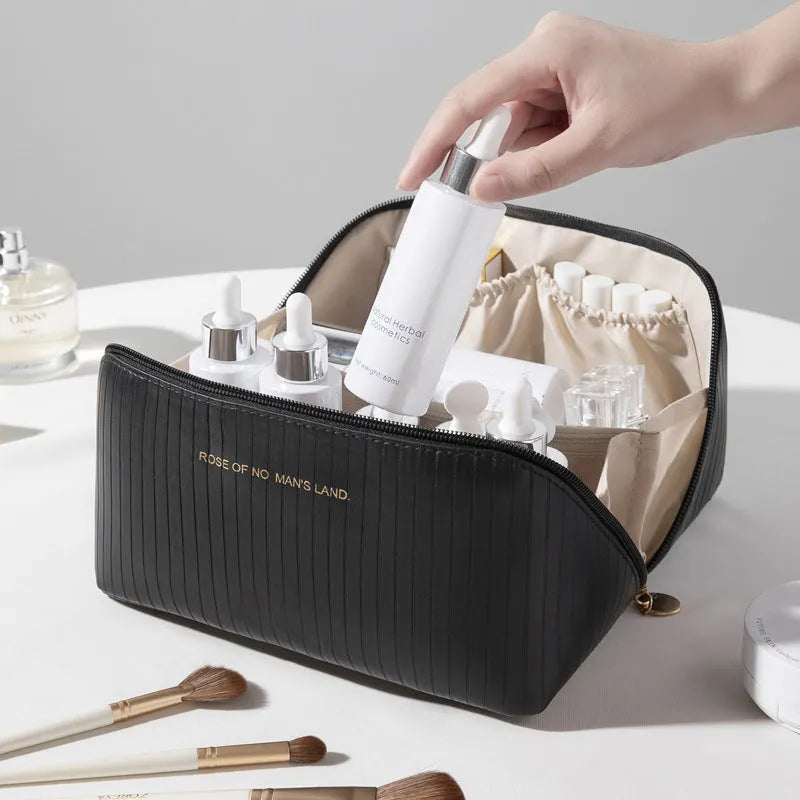 Vertical pattern cubic pillow makeup bag with 22.5 cm dimensions and PU construction