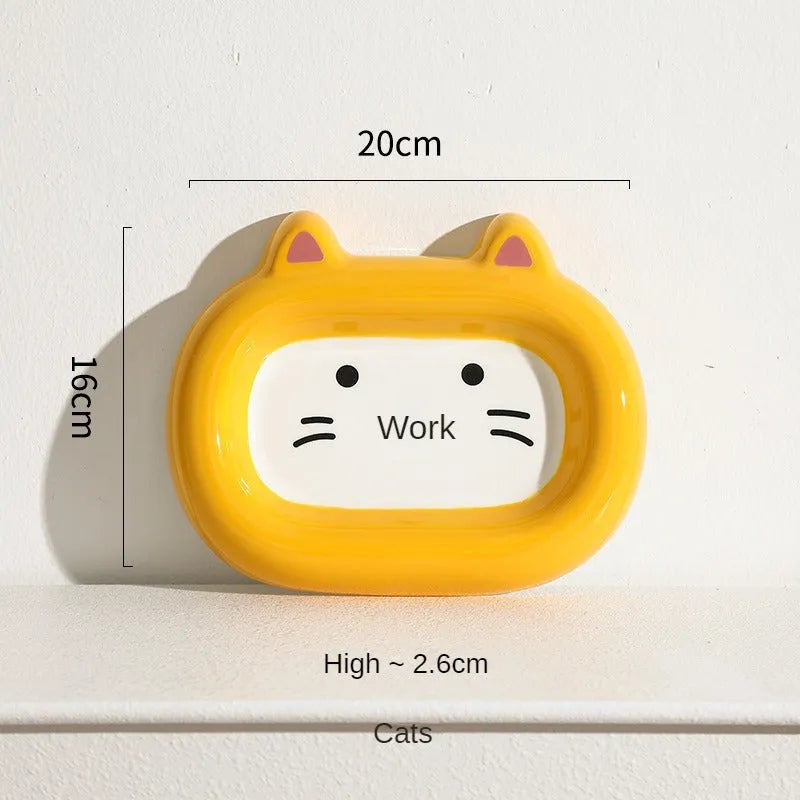 Ceramic animal-shaped cat bowl in a colourful design for pet feeding