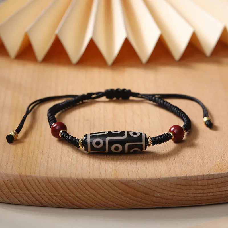 Men's shrinkable Tibetan agate dzi bead bracelet with original design, brown and white agate beads on wrist