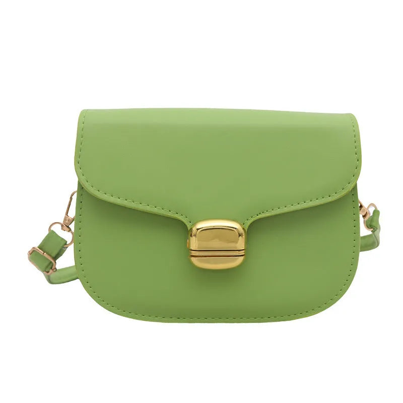 Simple PU leather handbag for women with zipper closure, available in multiple colours including black, brown, and green