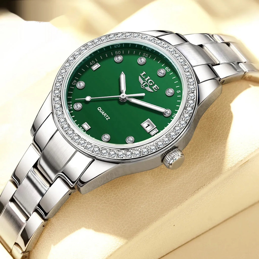 Women's silver tone quartz watch with diamond-encrusted bezel and luminous dial