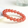 Natural South cherry red agate bracelet with polished beads in scattered design