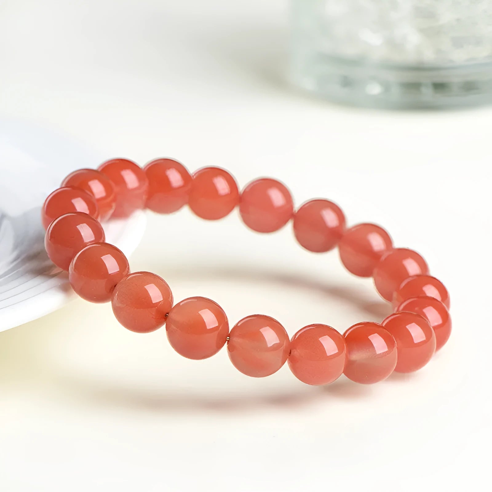 Natural South cherry red agate bracelet with polished beads in scattered design