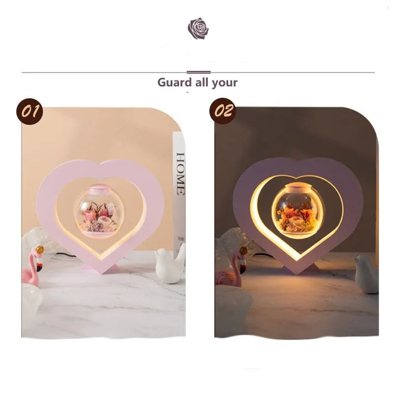 Pink preserved rose in ABS PC PVC ornament with Bluetooth base on tabletop