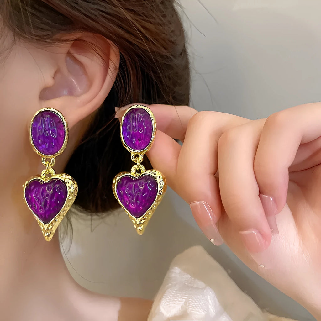 Oval love heart stud earrings with pleated texture in purple, red, green, and yellow-white colours