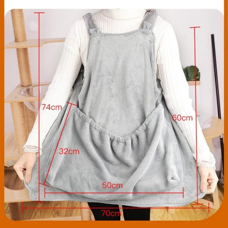 Plush pet carrier apron in beige with adjustable neck strap and head opening for small cats or dogs