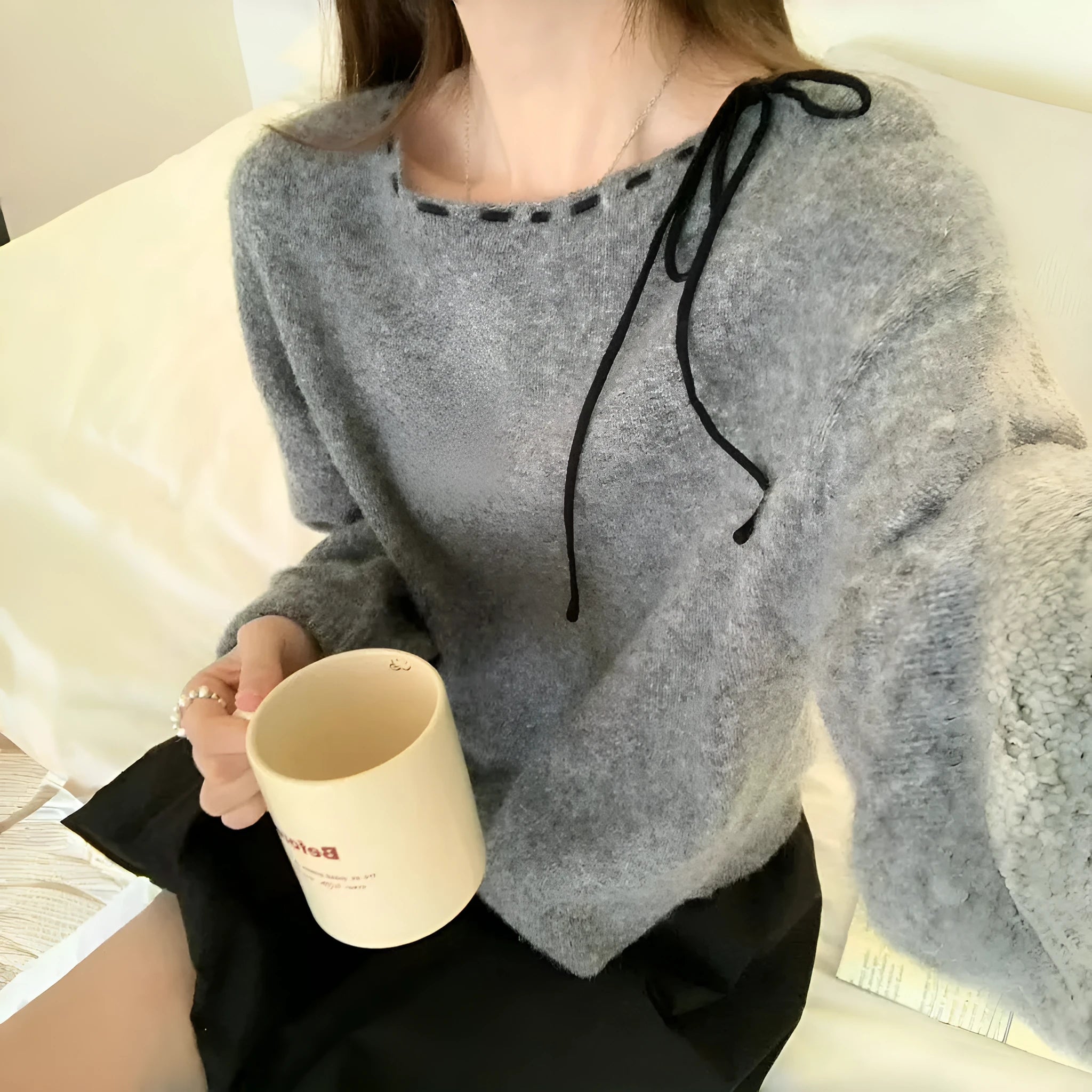 Women's loose grey pullover knitwear top made from regenerated cellulose fibre
