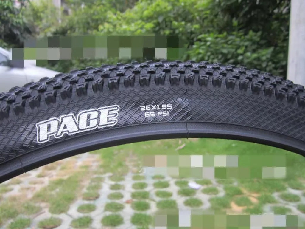 Mountain bike ultralight puncture proof tyre shown in black with white label sidewall option.