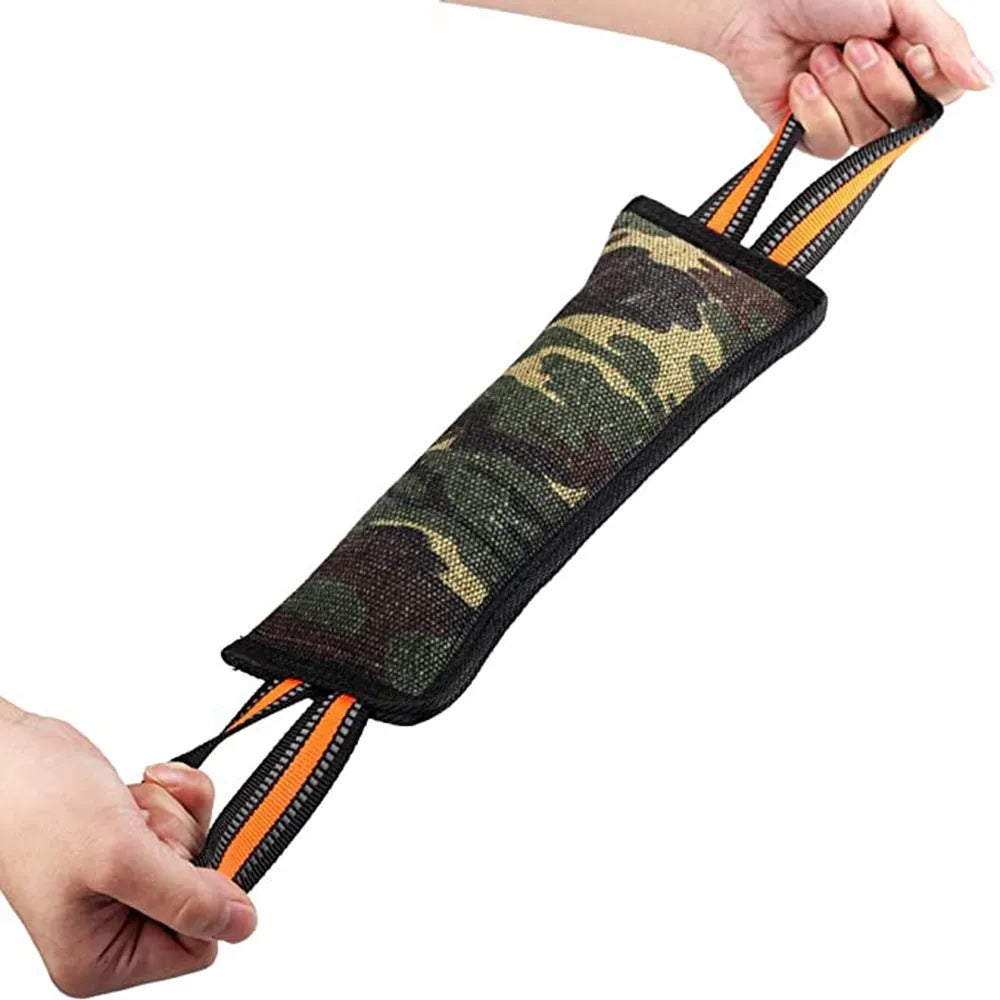 Reflective dog training bite stick with jute surface and yellow edge, 55cm total length, on outdoor ground