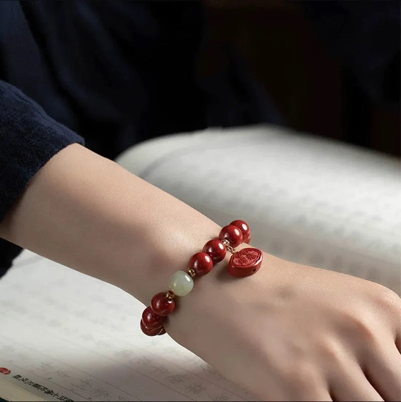 Cinnabar bracelet with emperor sandstone birth year charms in 8mm or 10mm bead sizes