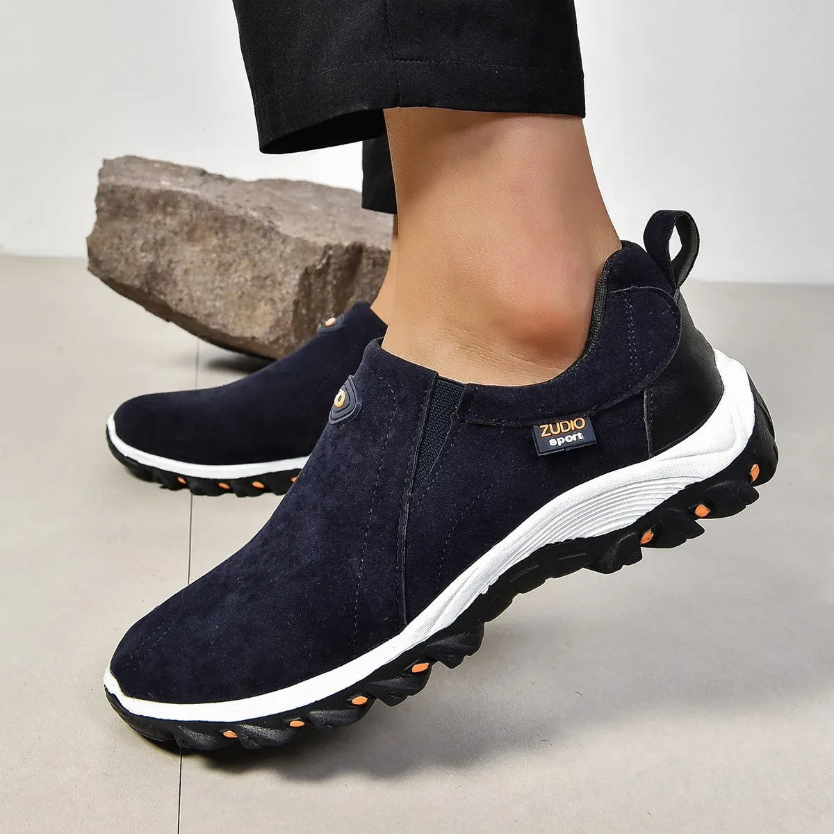 Men's round head thin shoes in five colours showing slip-on design for oversleeve applications