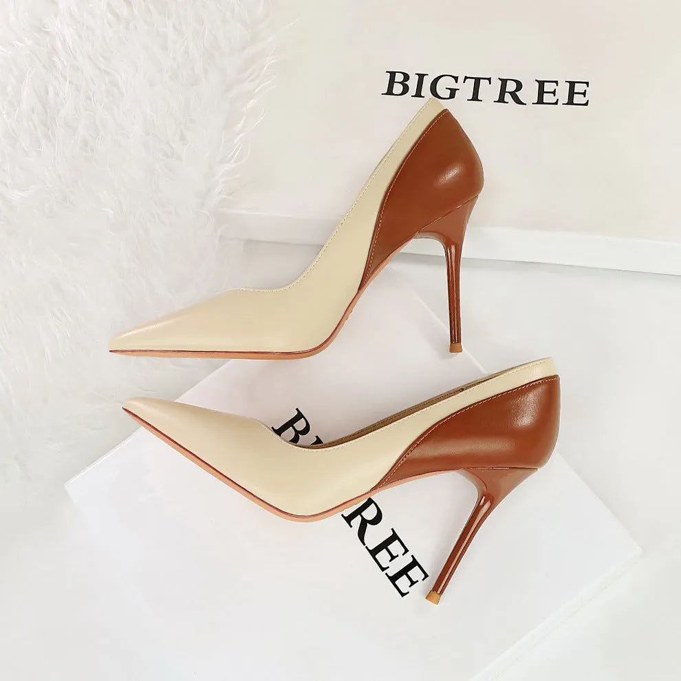 Women's stiletto heel pumps in colour block design with pointed toe and high heel for banquets