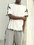 Casual white short sleeve top with printed draping design