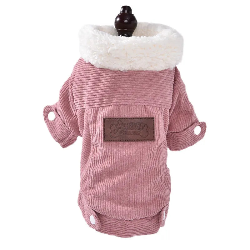 Lambswool fleece-lined dog vest in grey or pink, shown on a pet, for autumn and winter warmth.