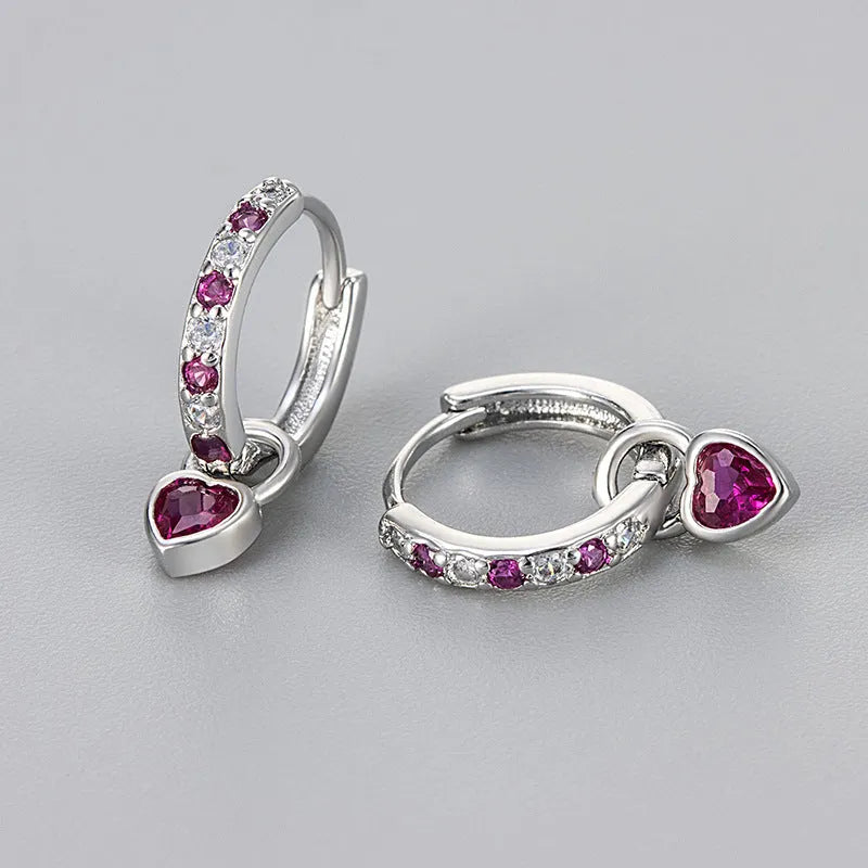 Women's heart-shaped drop earrings with coloured gemstones in gold and white gold tone settings