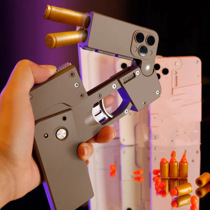Folding mobile phone dart blaster toy with soft foam bullets in pink