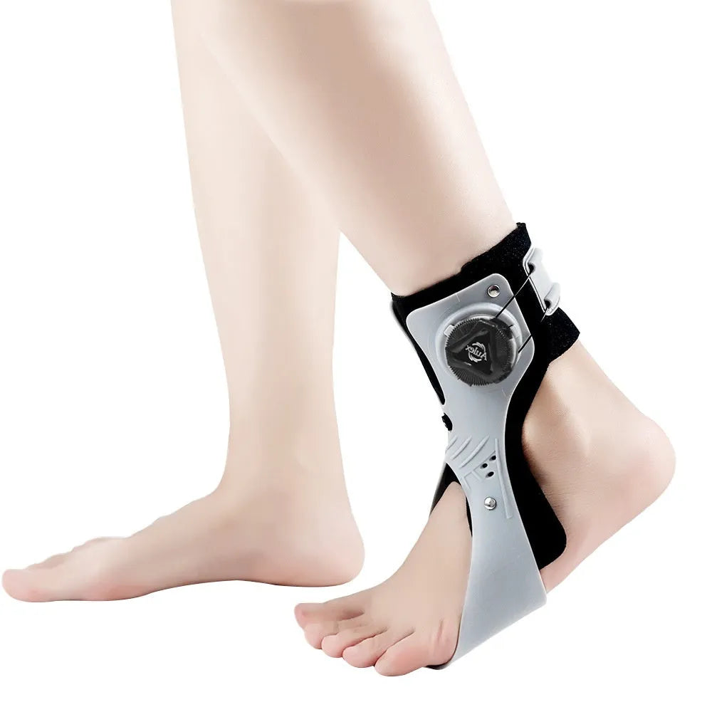 Grey and black ankle fixation brace with airbag button, shown in left and right foot sizes.