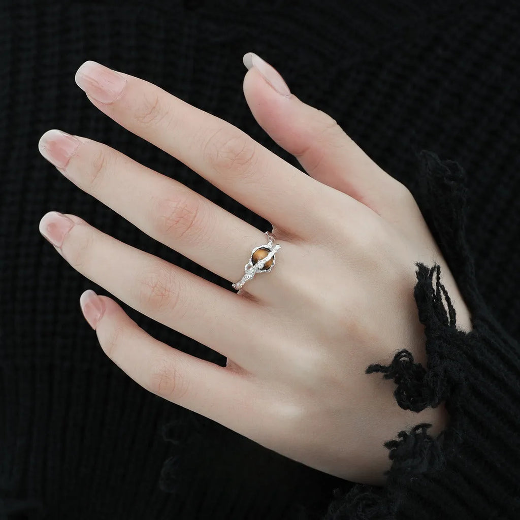 Adjustable Saturn and tigereye open ring in white gold colour electroplated silver