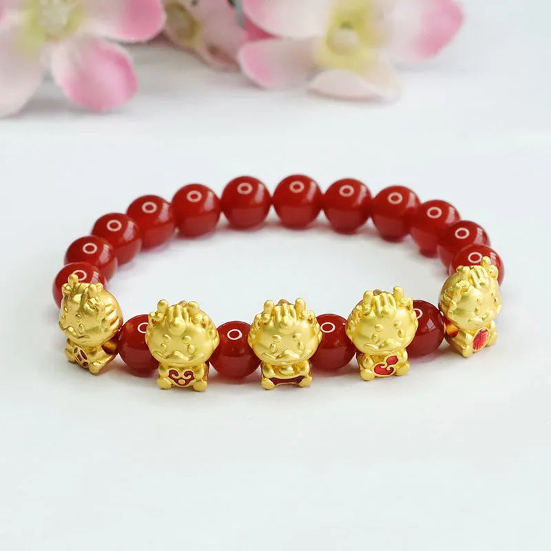 Red agate bracelet with detailed dragon carving on an 8mm bead.