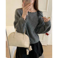 Women's loose grey pullover knitwear top made from regenerated cellulose fibre