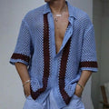 Men's blue hollow knit viscose short sleeve cardigan on a plain background
