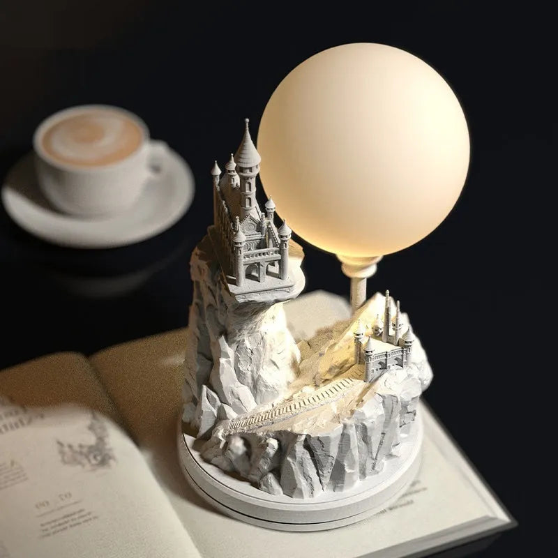 White composite gypsum table night lamp on a surface.