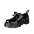 Women's black leather shoes with thick sole and cross-strap design