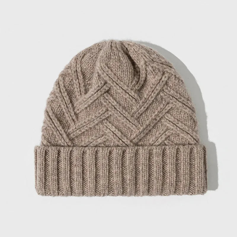 Women's wool knitted dome winter hat in ankela red colour showing thickened knitting texture