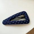 Retro dot side barrettes for women in triangle and water drop styles with dark denim and polka dot motifs.