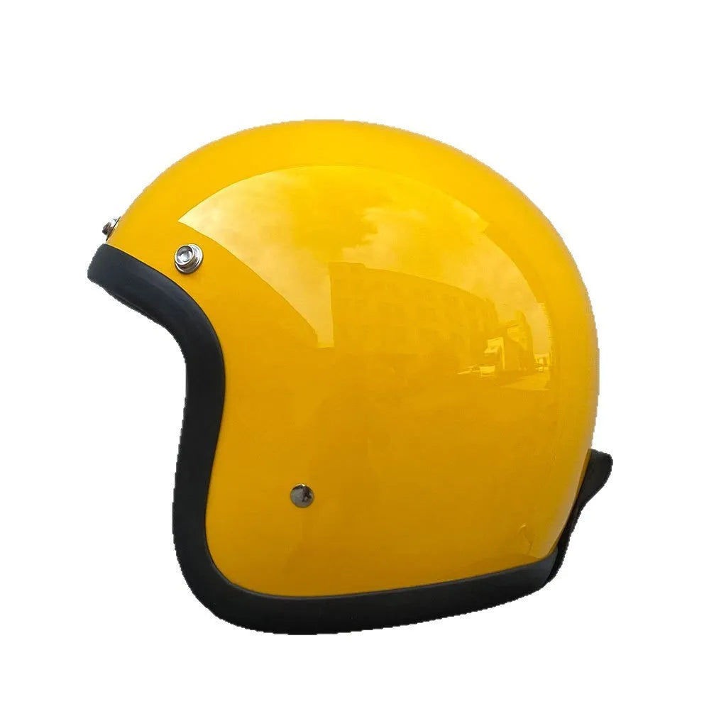 Glass fibre motorcycle half helmet in retro style shown in cement grey colour