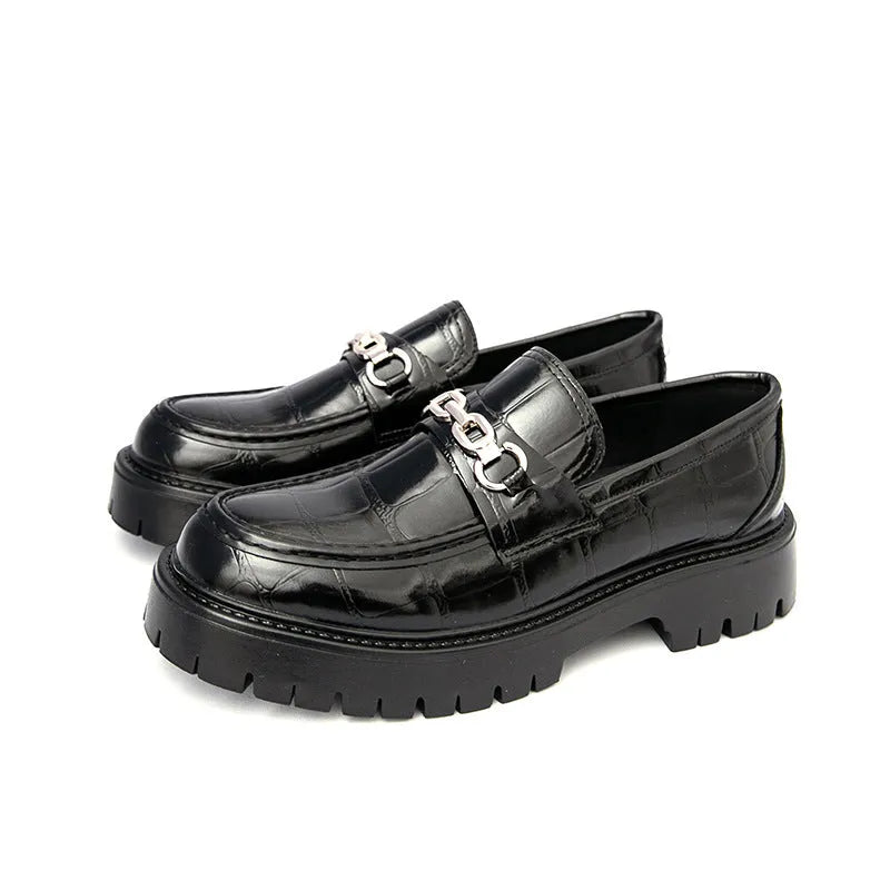 Pair of autumn men's crocodile pattern leather loafers in brown with flat heel platform sole