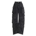 Blue high waist wide leg women's trousers with multiple pockets on a street style background.
