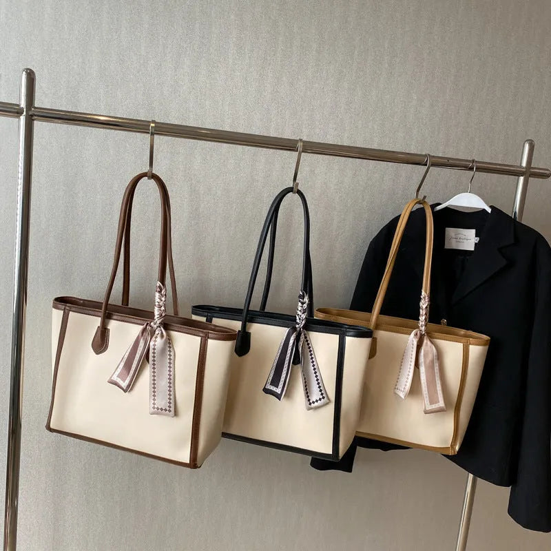 Advanced Texture Winter Commuter Tote Shoulder Bag in black colour, horizontal square shape with open outer pocket and textured PU finish
