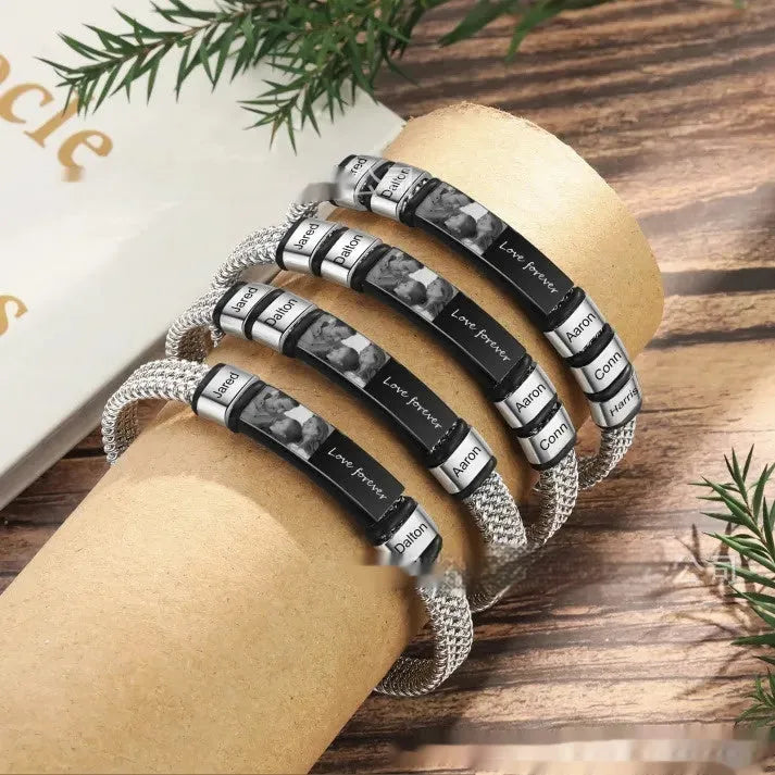 Men's stainless steel bracelet with leather rope band and lettering beads showing heart-shaped pendant
