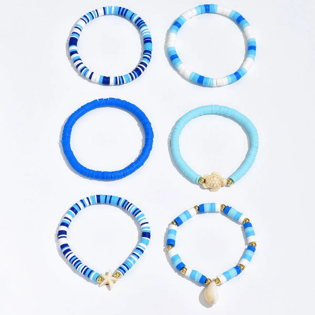 Bohemian blue polymer clay handmade shell bracelet suit set of 6 unisex bracelets on display