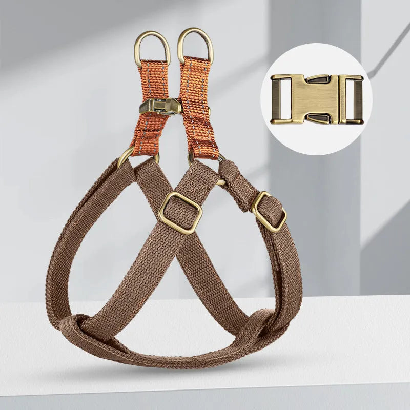 Brown vest-style anti-loss dog leash with cotton belt and nylon construction showing alloy fastener