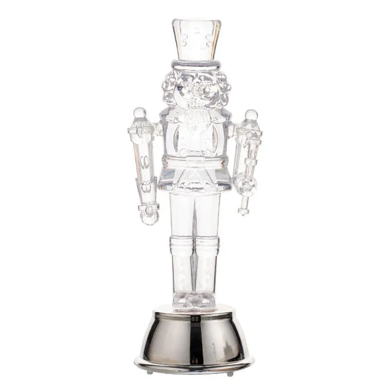 Transparent plastic walnut soldier nutcracker Christmas ornament decoration on desktop
