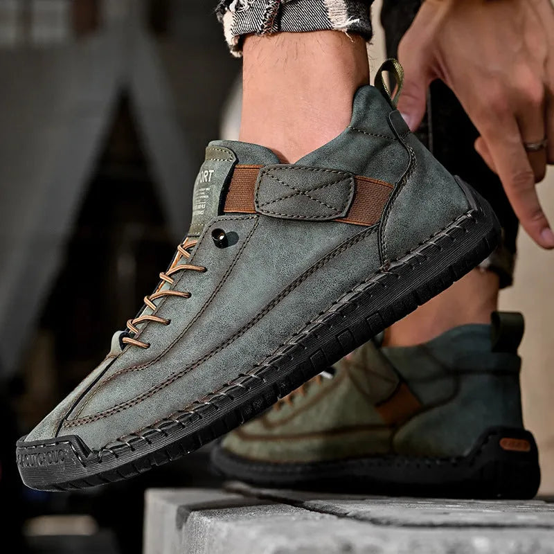 Men's mid-top Martin boot in a solid colour with elastic band and tooling stitching detail.