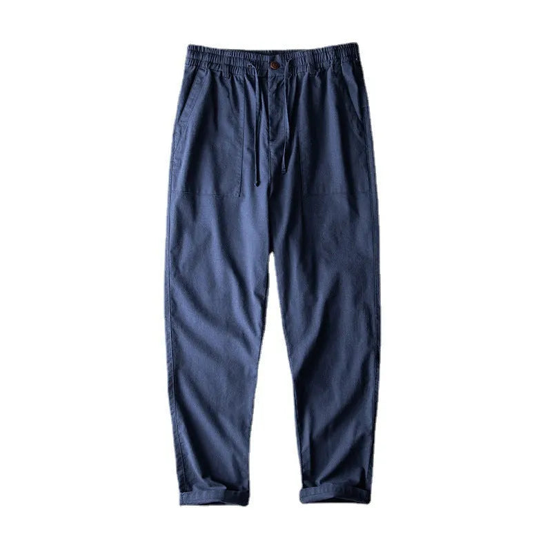 Men's linen casual trousers in solid colour with mid-waist styling and full length