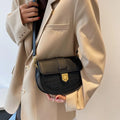 French one shoulder saddle bag in medium-soft PU with lock and stone pattern, available in black, brown, beige, and coffee