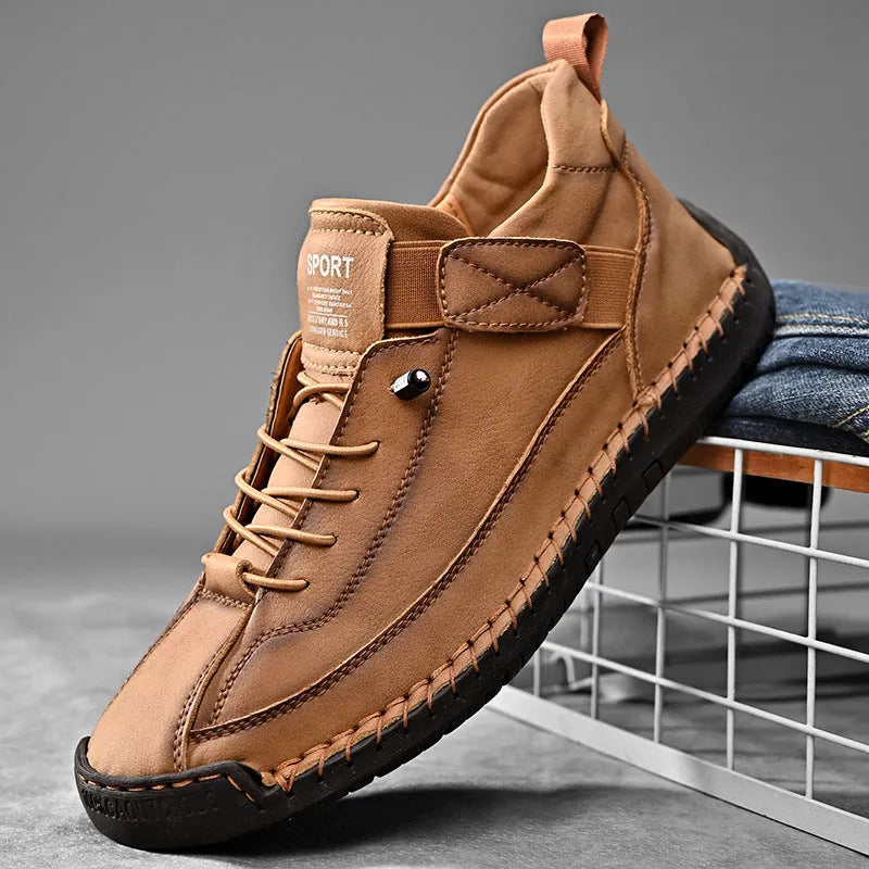Men's mid-top Martin boot in a solid colour with elastic band and tooling stitching detail.