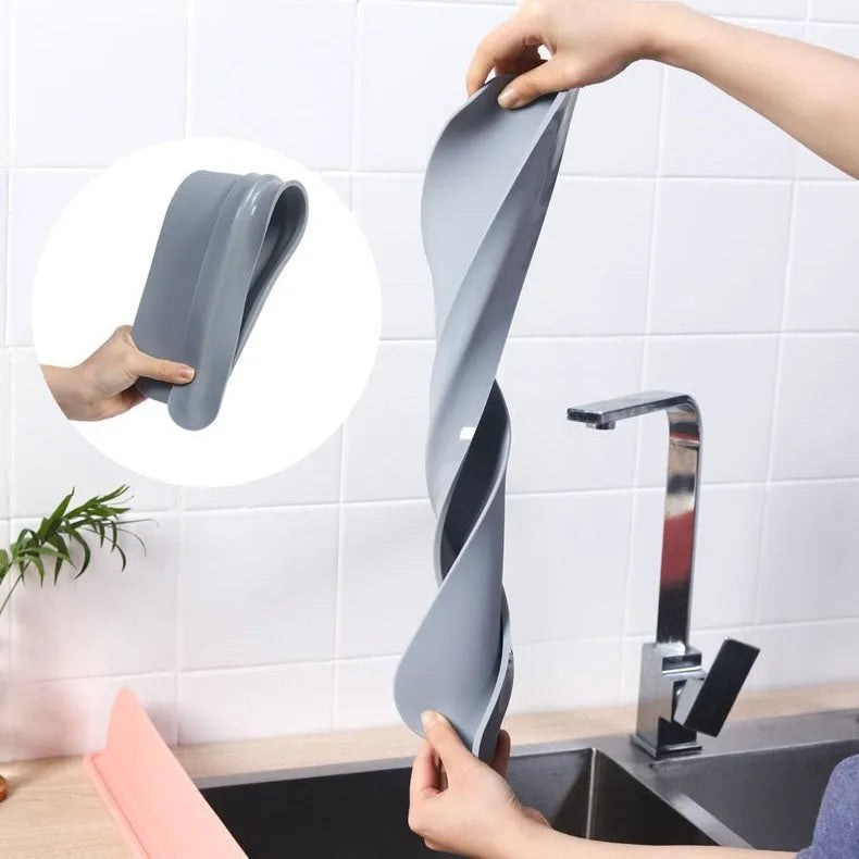 Silicone kitchen sink water blocking plate measuring 52mm wide x 5mm thick x 85mm tall in grey blue colour