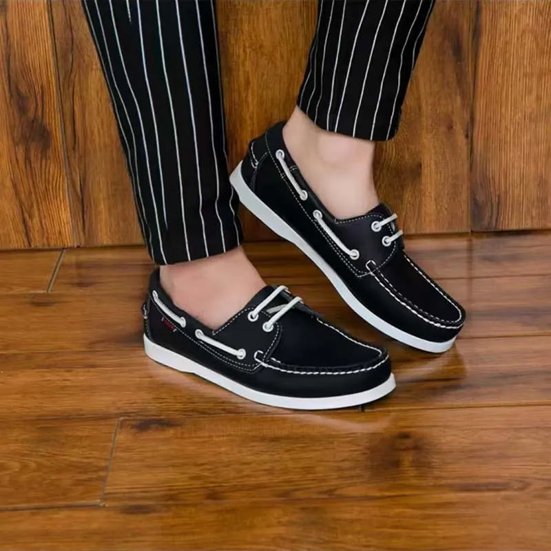 Men's classic British style casual shoes with artificial PU upper and flat heel in black.