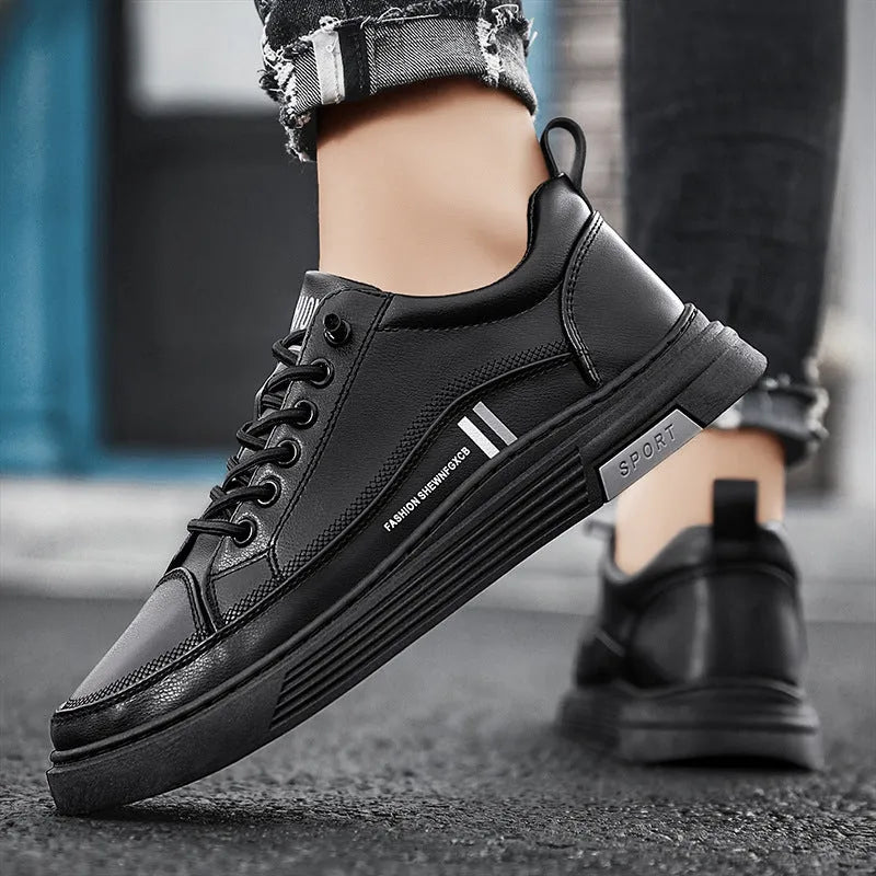 Men's white low-top skate shoes with an elastic band and round toe, on a rubber sole.