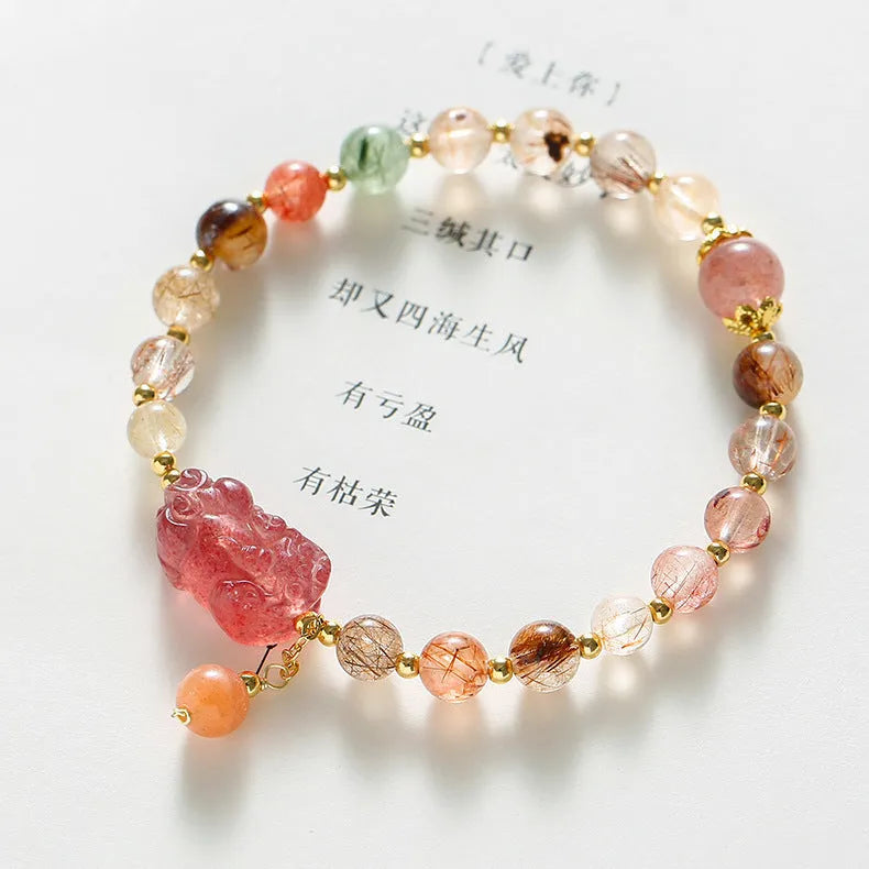Women's crystal copper bracelet with dopamine crystal colour and pearl elements on natural stone finish