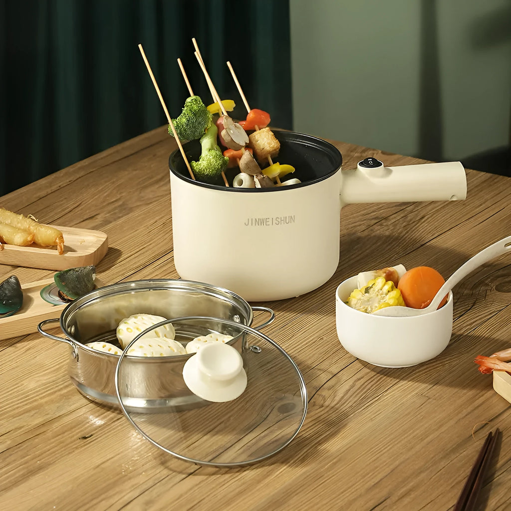 Mini hot pot electric cooker with stainless steel body, non-stick pot, available in green, compact size 12.7x17x15 cm